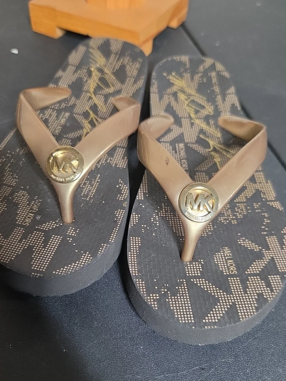 Michael Kors Brown Flip Flop Sandals with Gold MK Medallion